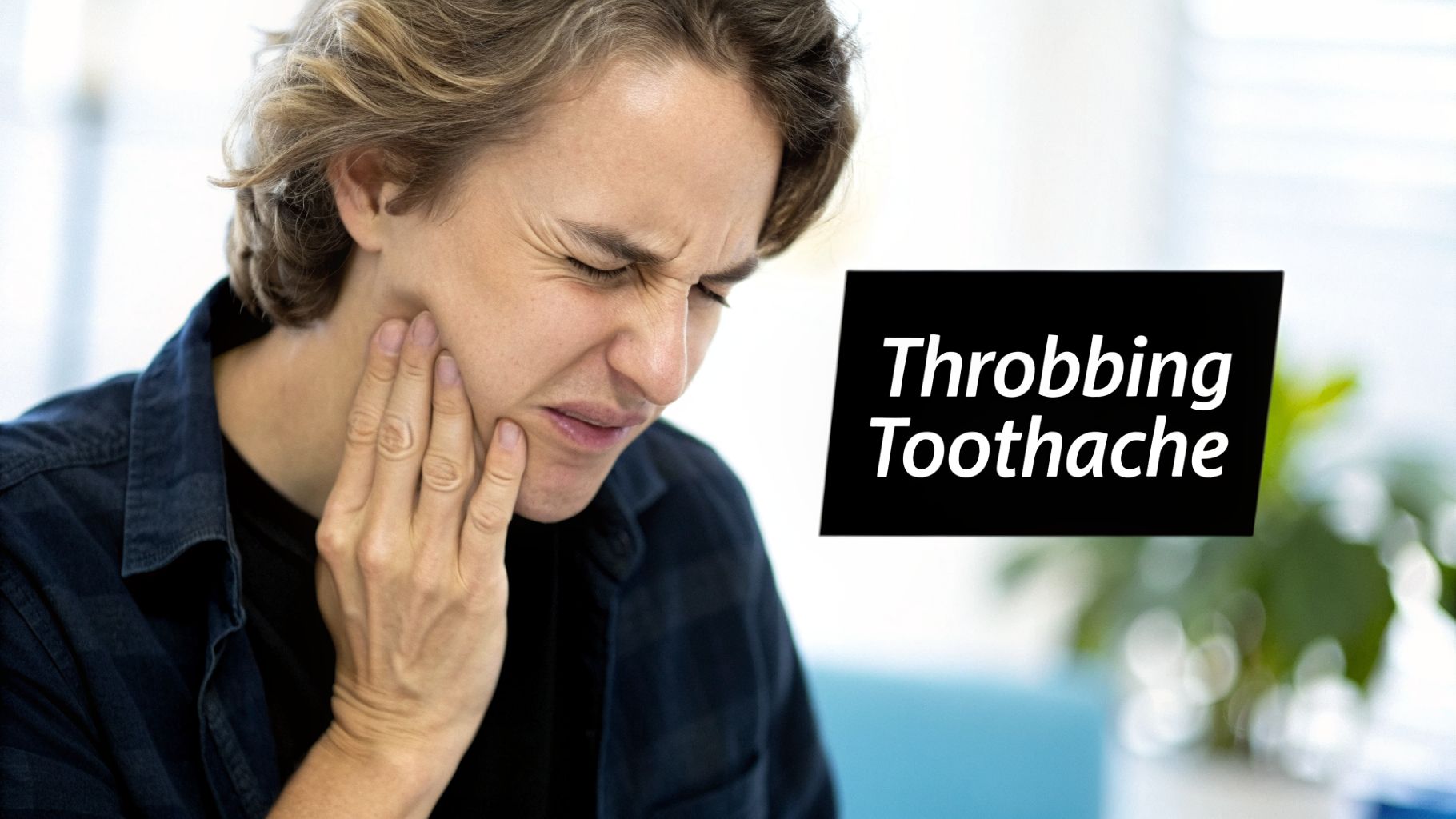 A person with a pained expression holding their cheek due to a throbbing toothache, seeking relief.