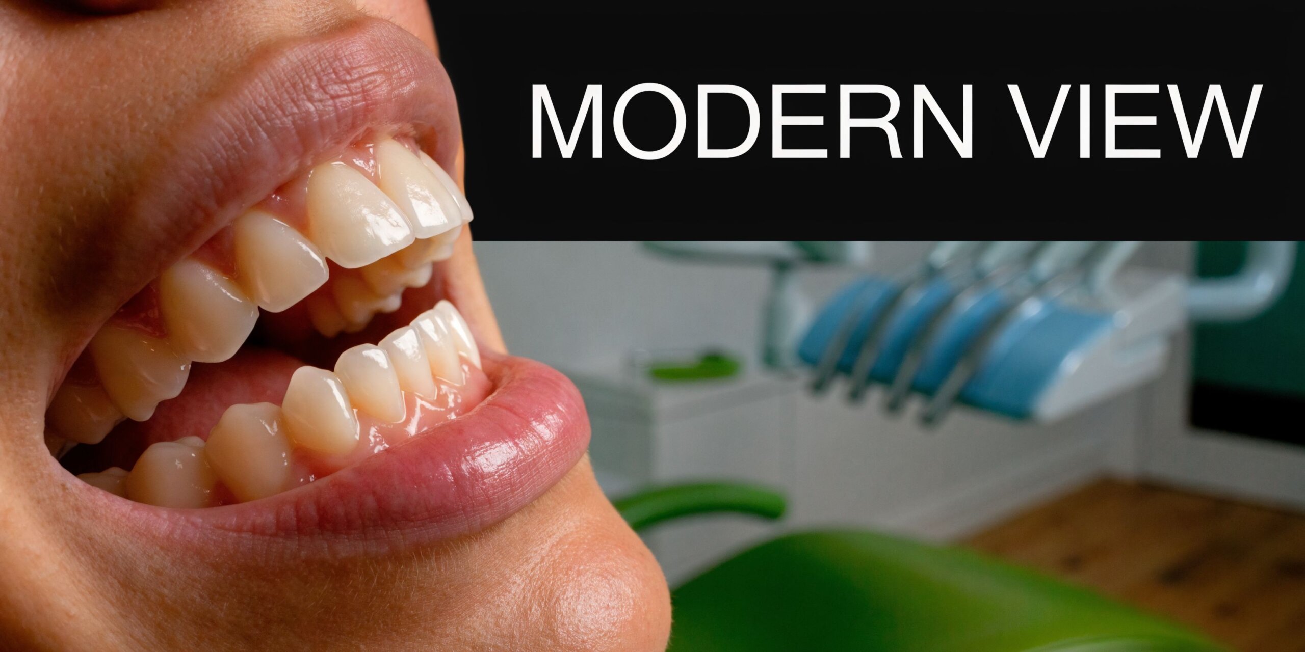 A close-up view of a patient's mouth with white teeth during a dental examination in a clinic.