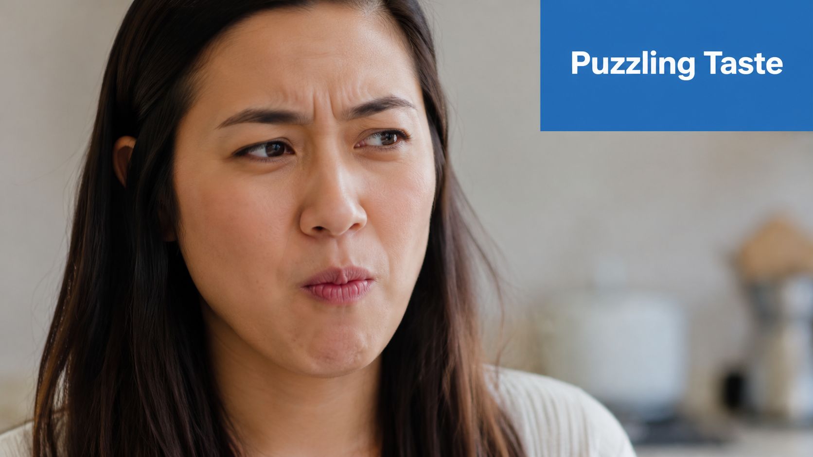 A woman making a puzzled expression while tasting food, reflecting a confused reaction to a flavor.